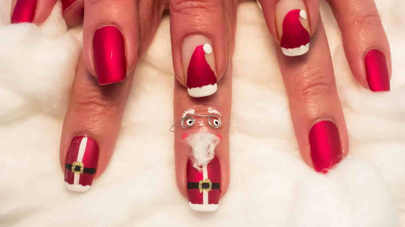 8. Christmas Nail Art with Reindeer and Santa Claus - wide 9