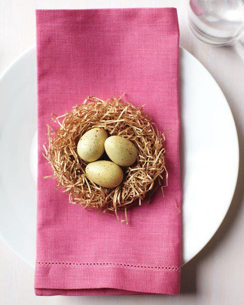 This sweet mini bird’s nest can be crafted in minutes using store-bought paper grass and a handful of candy eggs.