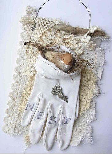 beautiful - bird nest in the pocket of a vintage glove