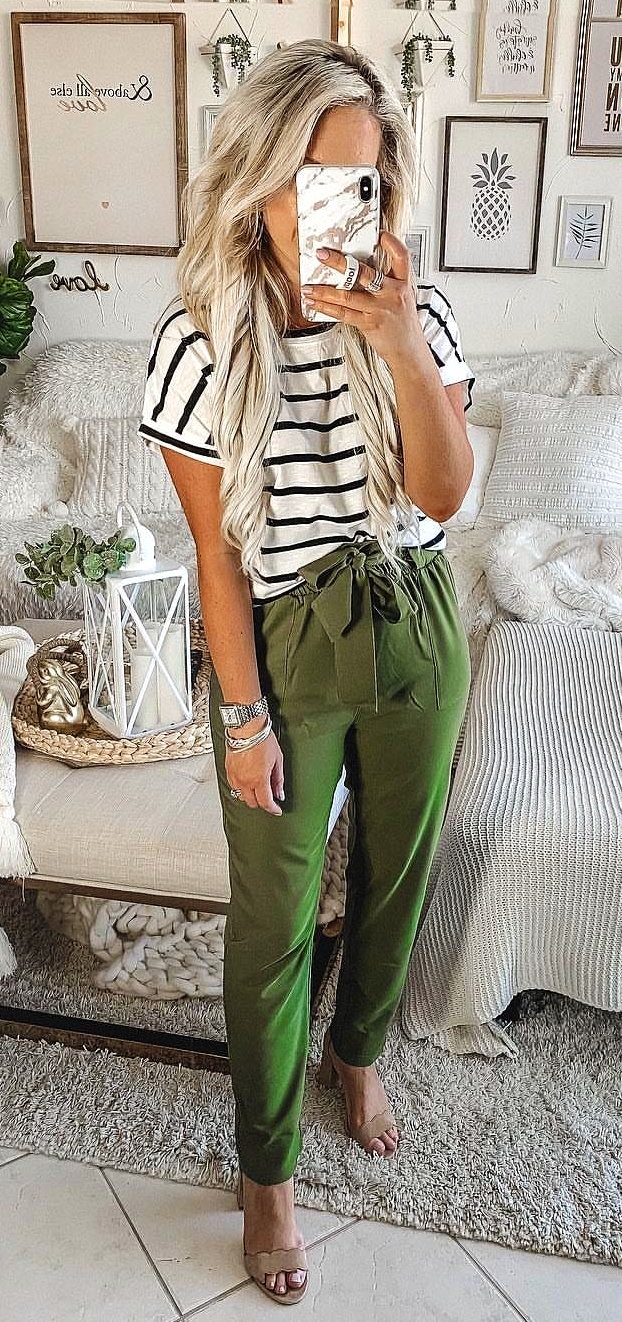 Green pant, black and white strip top and brown sandals. Awesome Striped Summer Outfits to Explore