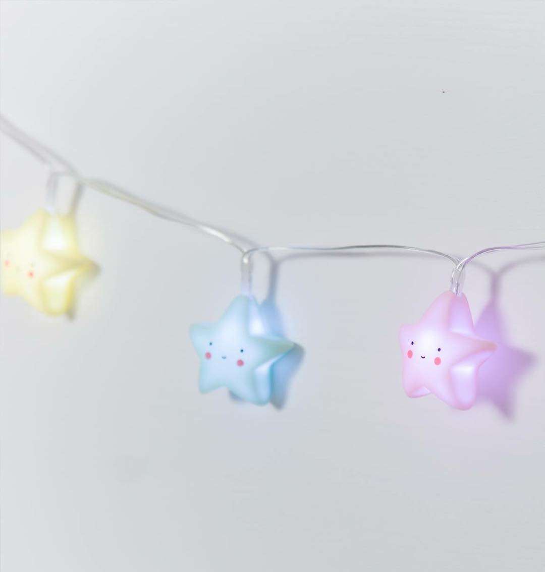 The imaginative lights of a little lovely company bring great attention to any nursery. #starlight #stringlights #fun #kidsinterior #light #kidsdesign #forkids #colorful #star