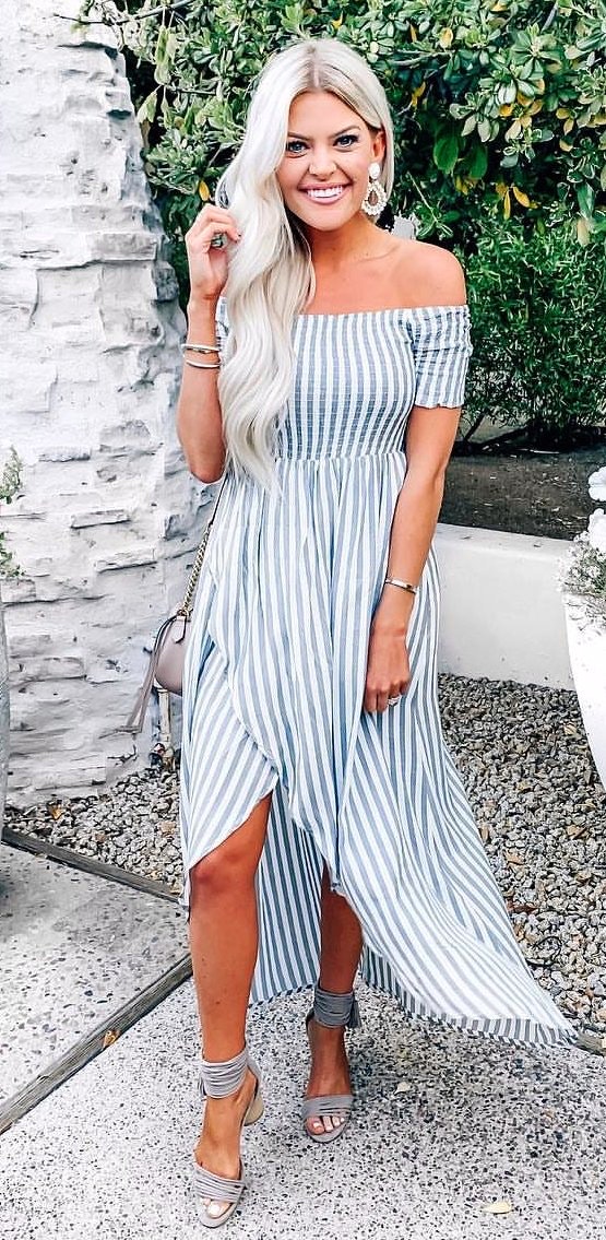 White and green striped off-shoulder dress with matching high heels.