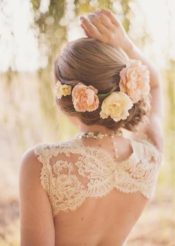 Braided Hairstyle Decorated With String Of Fresh Flowers