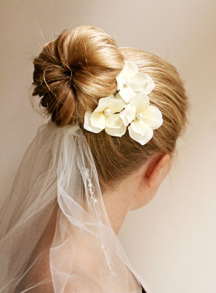 Elegant Bun With Flowers