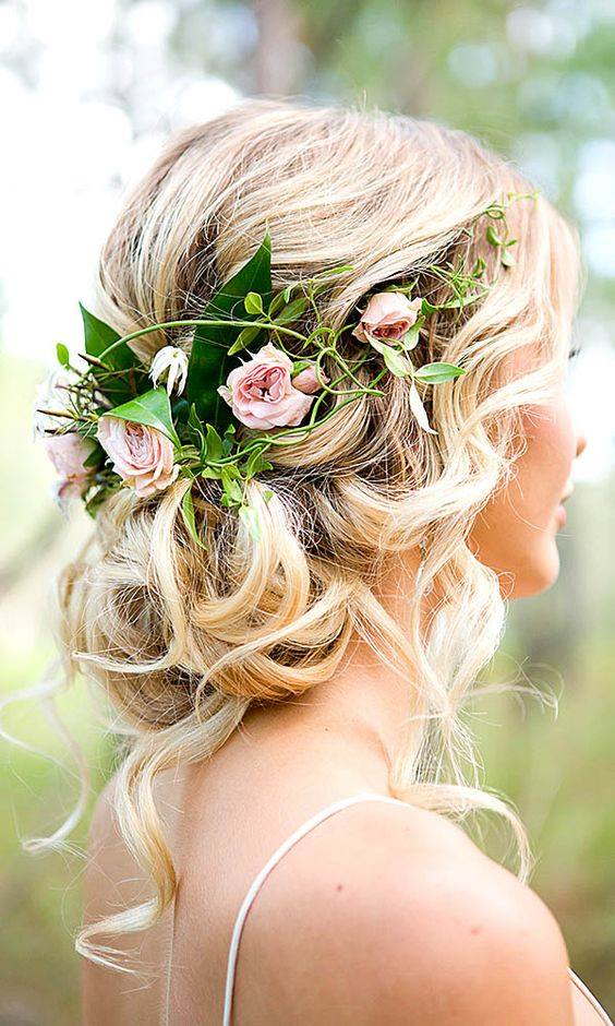 Hairstyle With Flowers And Some Fresh Leaves