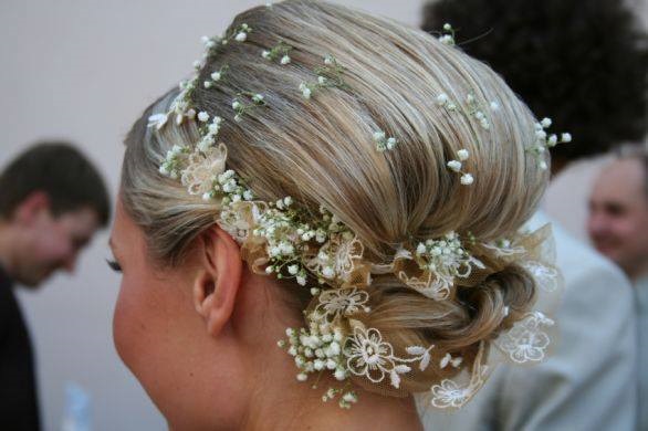 Hairstyle With Flowers Perfect For Summer Wedding
