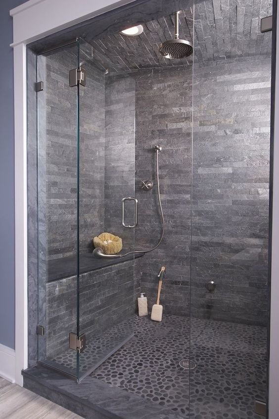 Wow love this dark stone shower cave!!