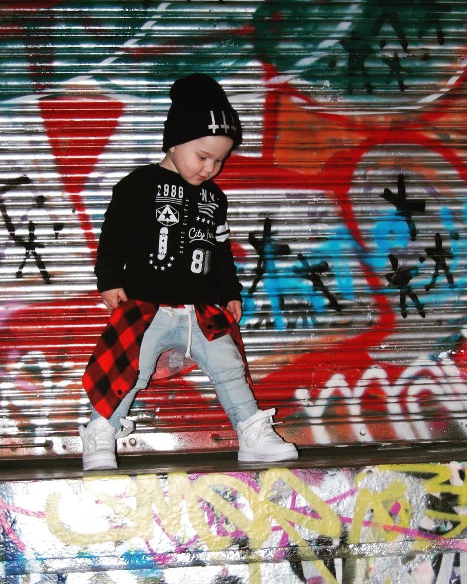 Cool Little Boy With White Sneakers