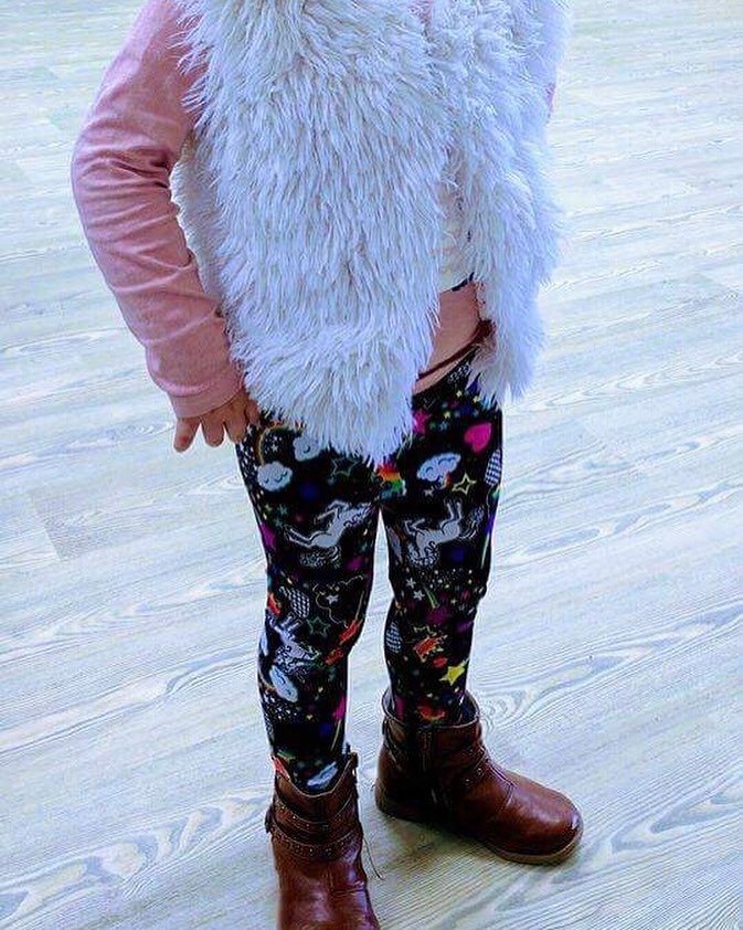 Gorgeous Munchkin Wearing Unicorn Rarr Tights With Brown Sneaker