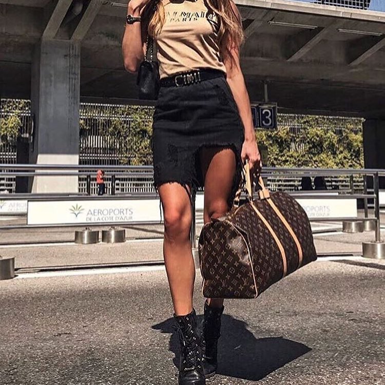 Simple T-Shirt With Short Black Skirt