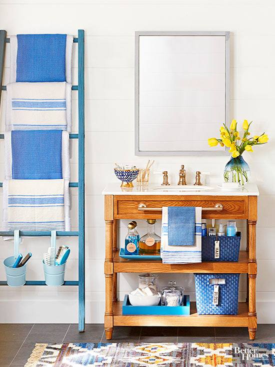 A vintage ladder adds style and storage to a bath!