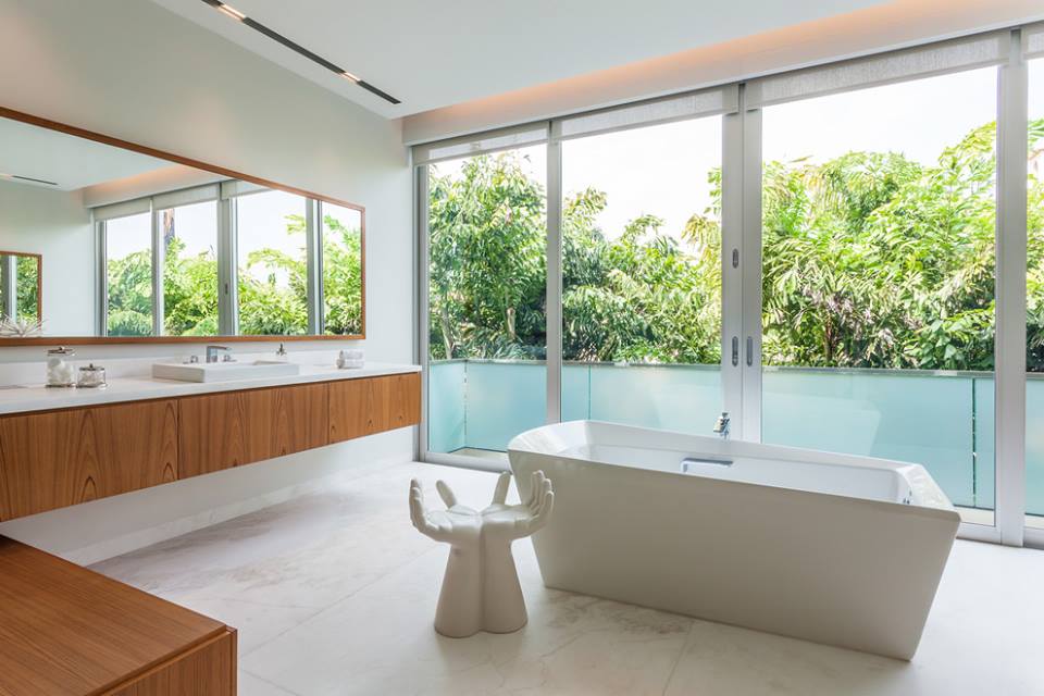 Attractive Contemporary Bathroom With Wooden Cabinet, Big Mirror, Naural View And Awesome Hand Shape Seat