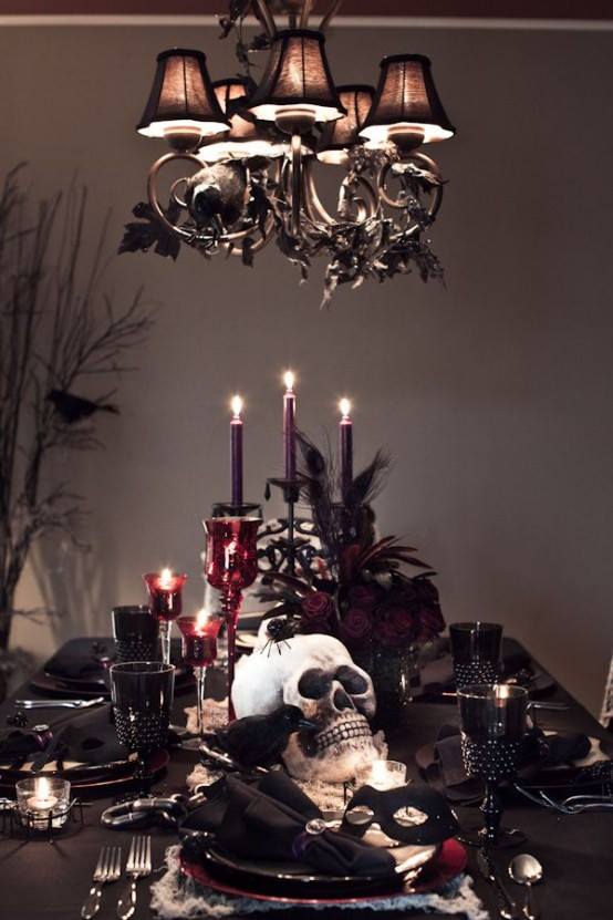 Awesome Halloween decor for a dinner. Table and lamp are so moody decorated....