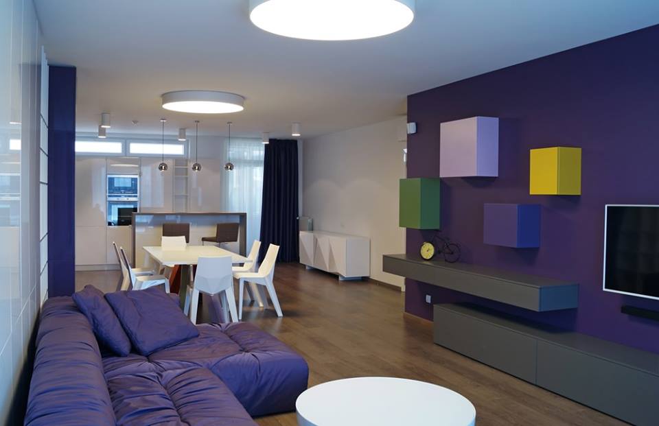 Bright Studio Apartments With Purple Sofa, White Dinning Table & Awesome Lighting