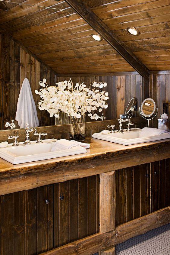 Designer Cabin Rustic Bathroom With Wooden Cabinets, Big Mirror & Flower Decor
