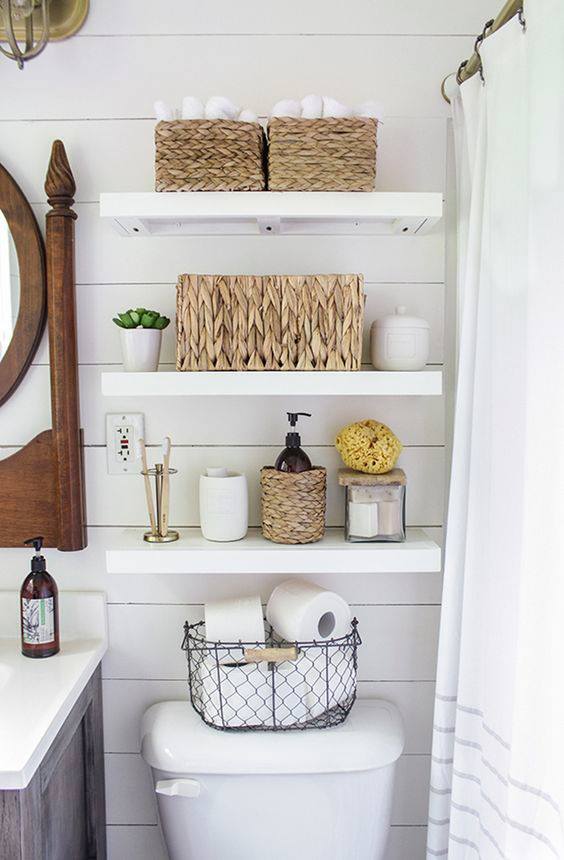 Love the floating shelves above! This is a great storage idea for a small bathroom.