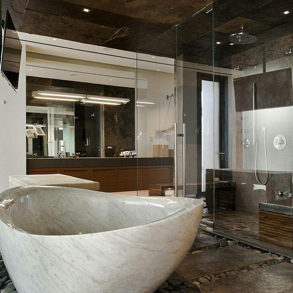 Marble Bath Tub, Big Mirror, Rain Shower And Stone Flooring