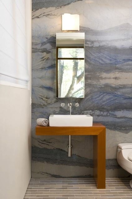 Natural Stone Wall Looks Elegant With Rectangular Mirror