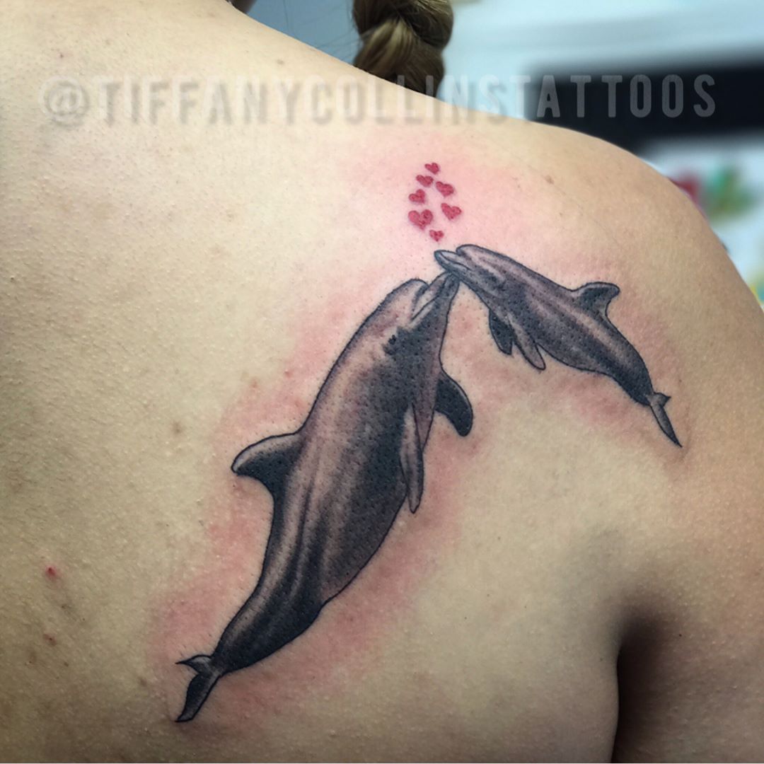 Romantic Dolphin Tattoo Idea