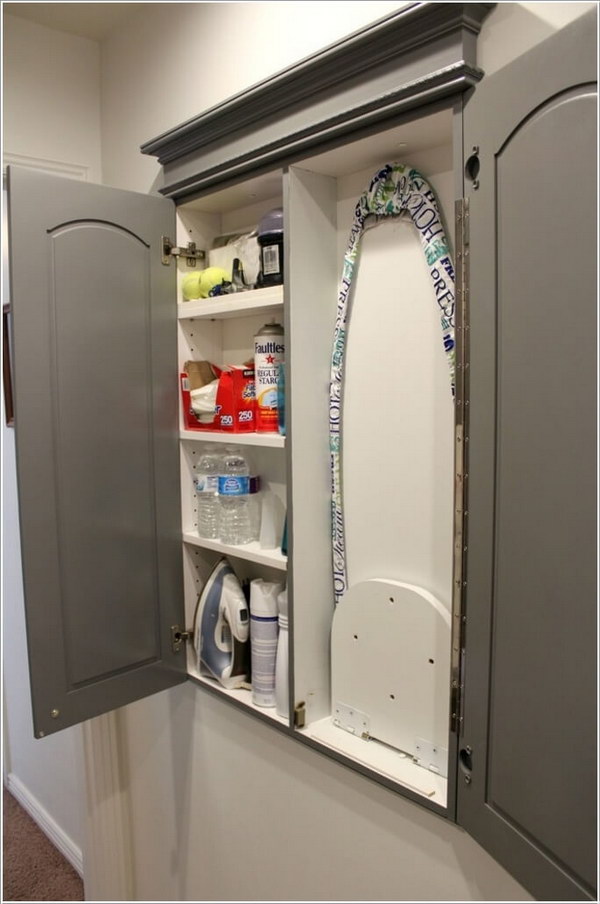 Shallow Closet with Hidden Storage for Laundry Supplies and A Fold Out Ironing Board