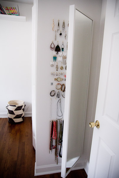 DIY a full-length mirror jewelry cabinet.
