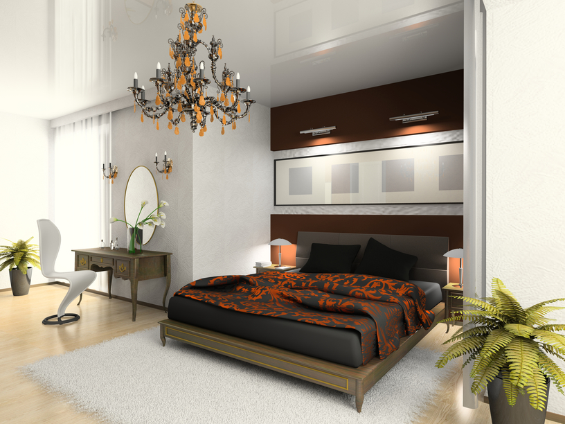 Elegant bedroom with recessed black and wood bed on light wood floor and white walls