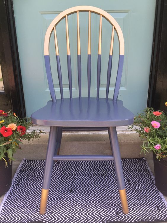 Gilded gold painted navy blue chair.