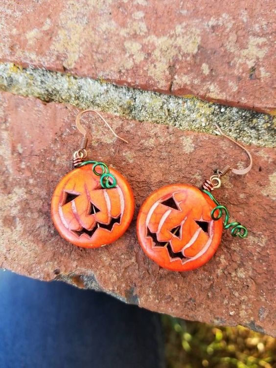 Jack o lantern earrings Pumpkin Halloween earrings with wire stem and vine.