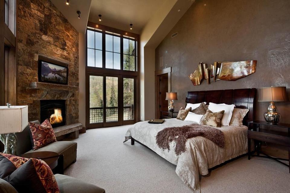 Lovely Rustic Master Bedroom Design With Awesome Wall Decor, Fire Pit And Sofa