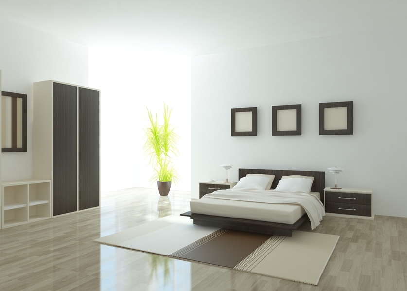 Simple wood and white master bedroom with wood bed frame, floating side-tables and white walls