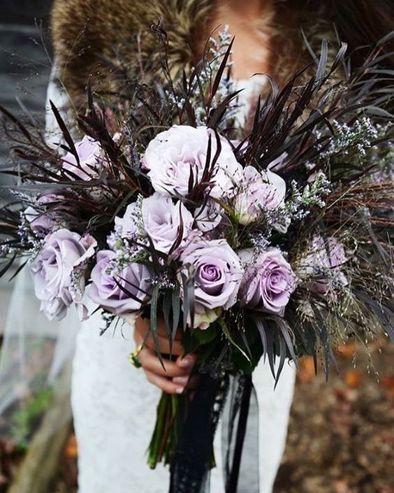 Such a stunning bouquet Its perfect for a Halloween wedding.