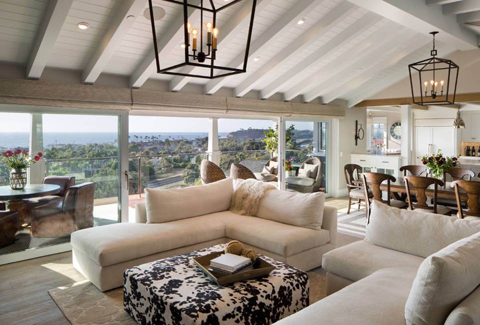 Open Living Room With Beige Walls And Mediun Tone Hardwood Floors