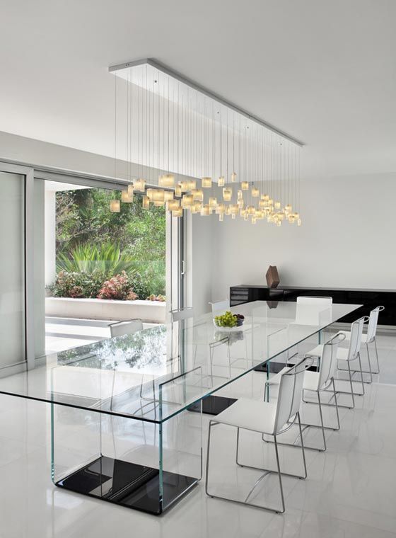 A clear glass dining table - Dining Room Decorating Ideas