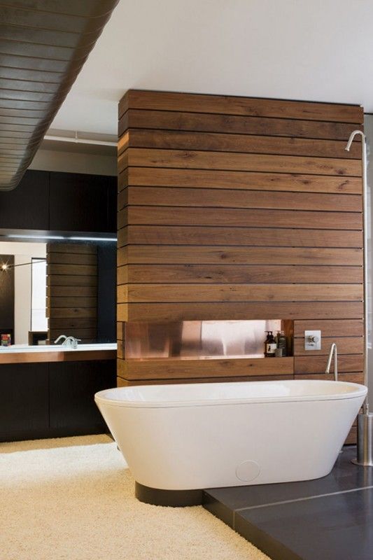 Add warmth and character to a rather stoic minimalist bathroom.