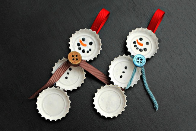 Bottle Cap Snowman via One Artsy Mama