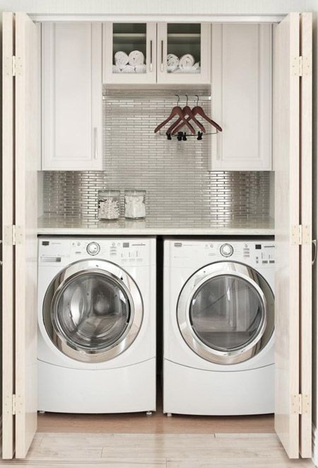 Brighten up your laundry wall a silvery backsplash.