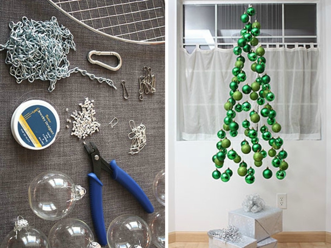 Chandelier of green baubles to represent a Christmas tree