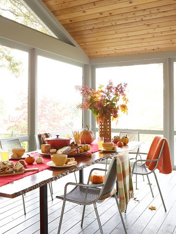 Fill an oversize jug with branches of leaves cut from the yard for a free centerpiece.