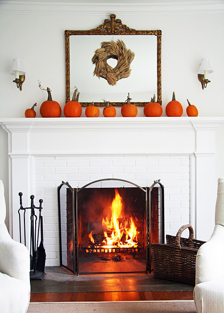 Single line of pumpkins and a wheat wreath