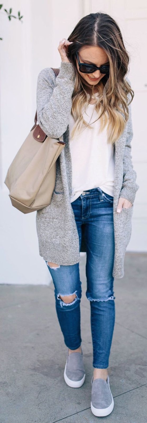 grey cardigan + top + ripped jeans + bag