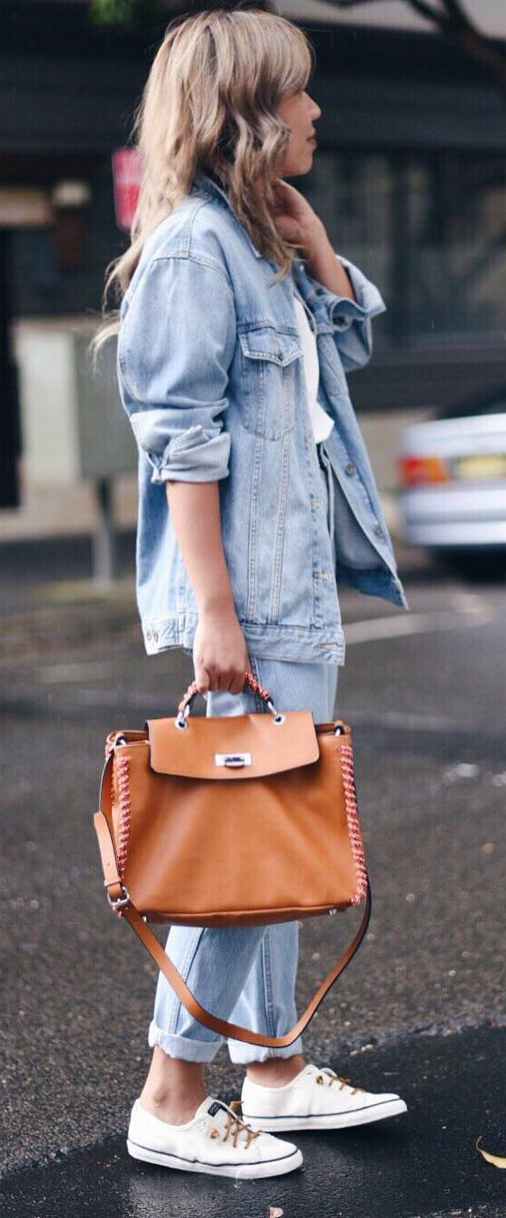 jacket + jeans + brown bag + sneakers