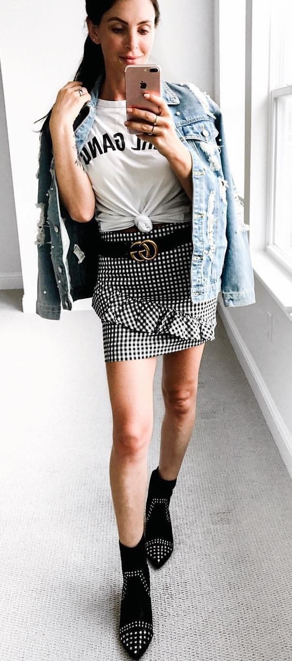 women's white and black crewneck shirt and black and white skirt and black suede booties