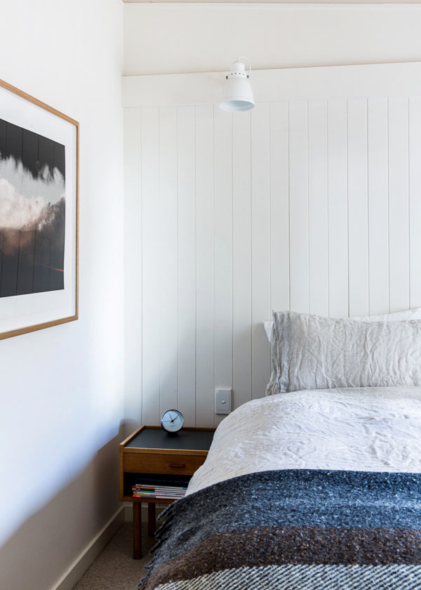 A Simple bedside Table Holds a few Bedroom Essentials