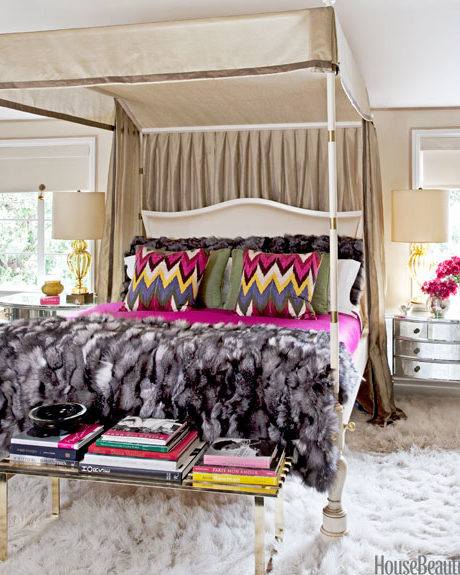 Fur Throw and Carpet Provide a Great Contrast to the Mirrored Bedside Tables