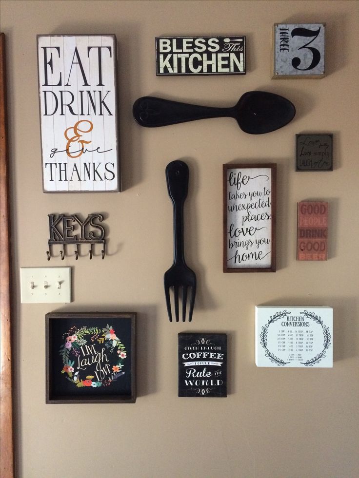 My kitchen gallery wall. All decor from hobby lobby and Ross.