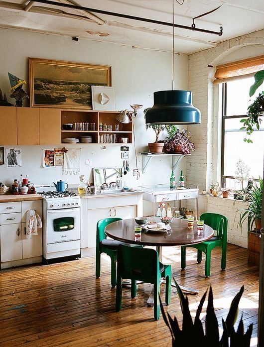 This kitchen is old and worn but well-loved.