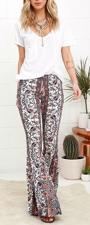 White top + peach and navy floral flares