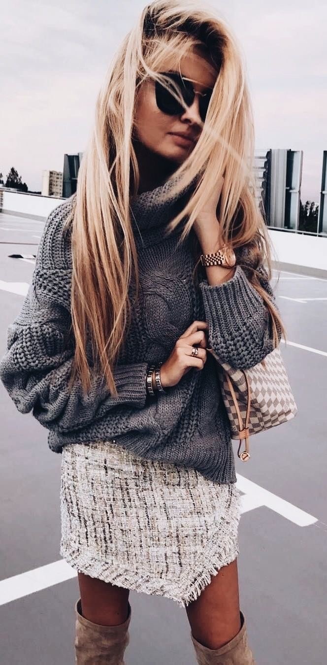 women's gray long-sleeve sweater with gray skirt