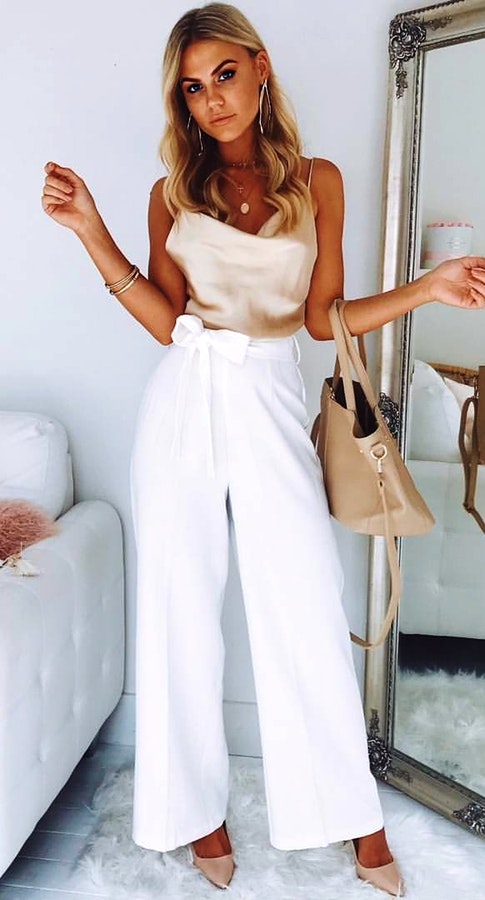 Beige spaghetti strap top and white pants. Fabulous Spring Outfits To Wear Now