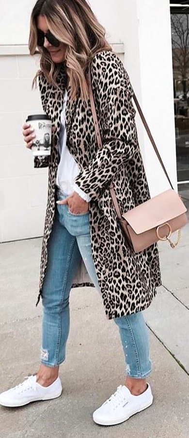 Black and white leopard print coat with jeans and crossbody bag. Pic originally posted by woman__streetstyles